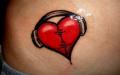 Tatuaje de corazón en la palma.  Significado del tatuaje de corazón.  Significado del color del tatuaje